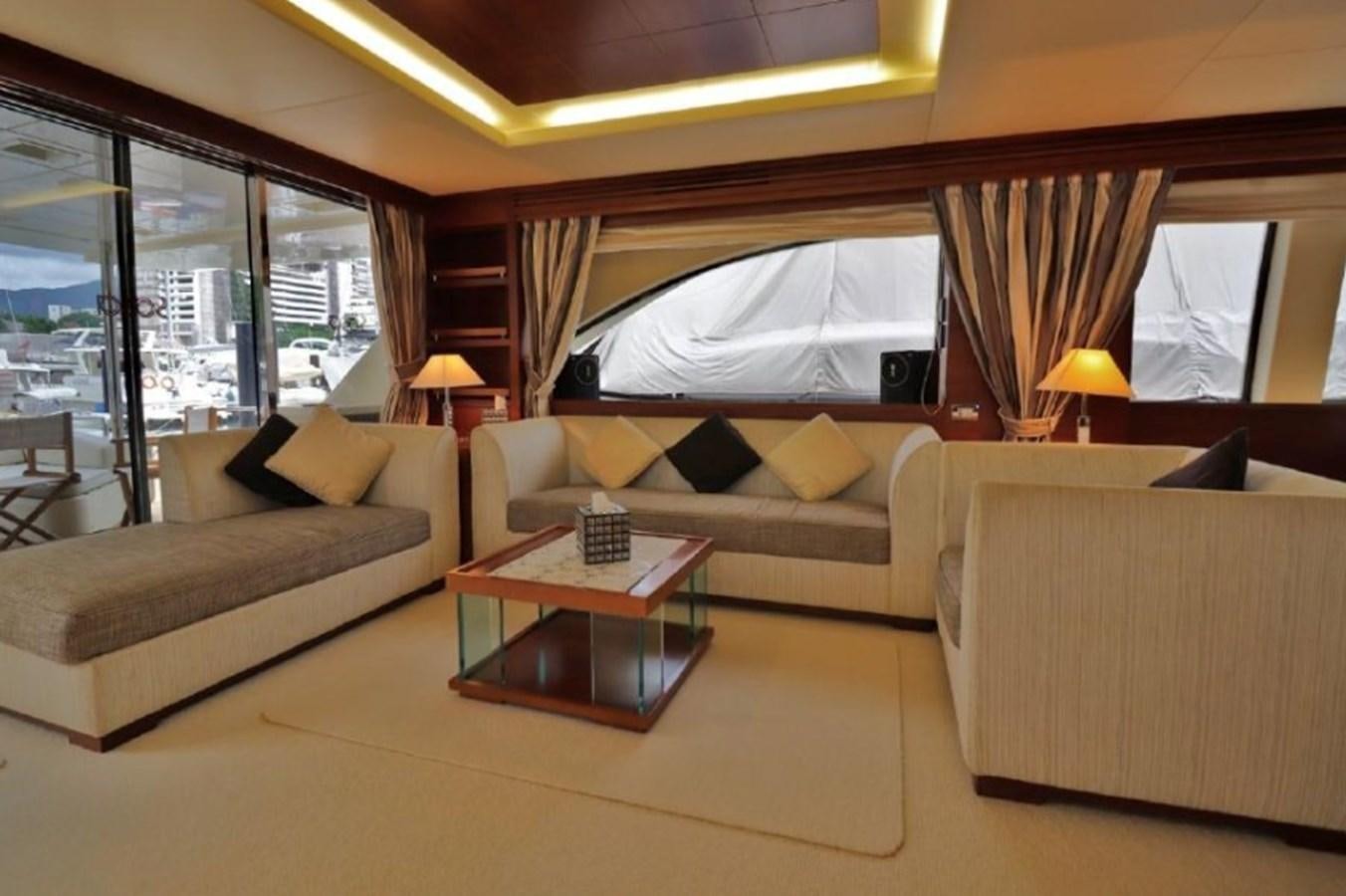 a living room with a large bed aboard AZIMUT AZ 85/124 Yacht for Sale