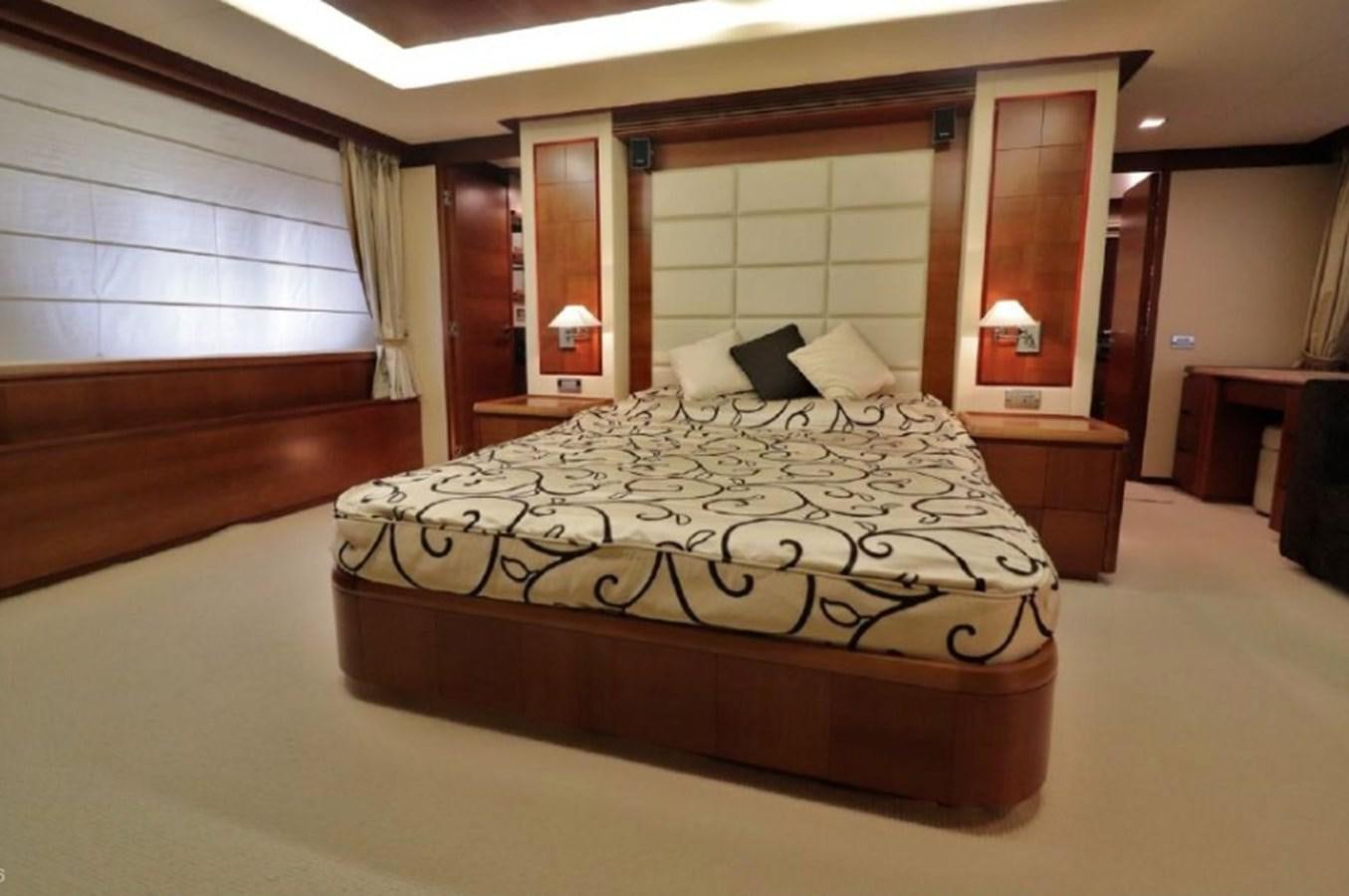 a large bed in a hotel room aboard AZIMUT AZ 85/124 Yacht for Sale