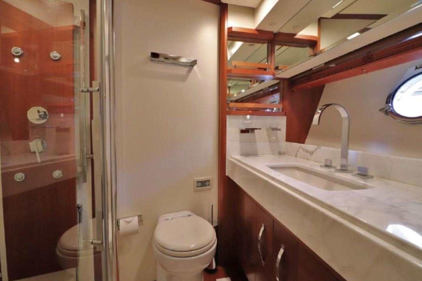 a bathroom with a sink and toilet aboard AZIMUT AZ 85/124 Yacht for Sale
