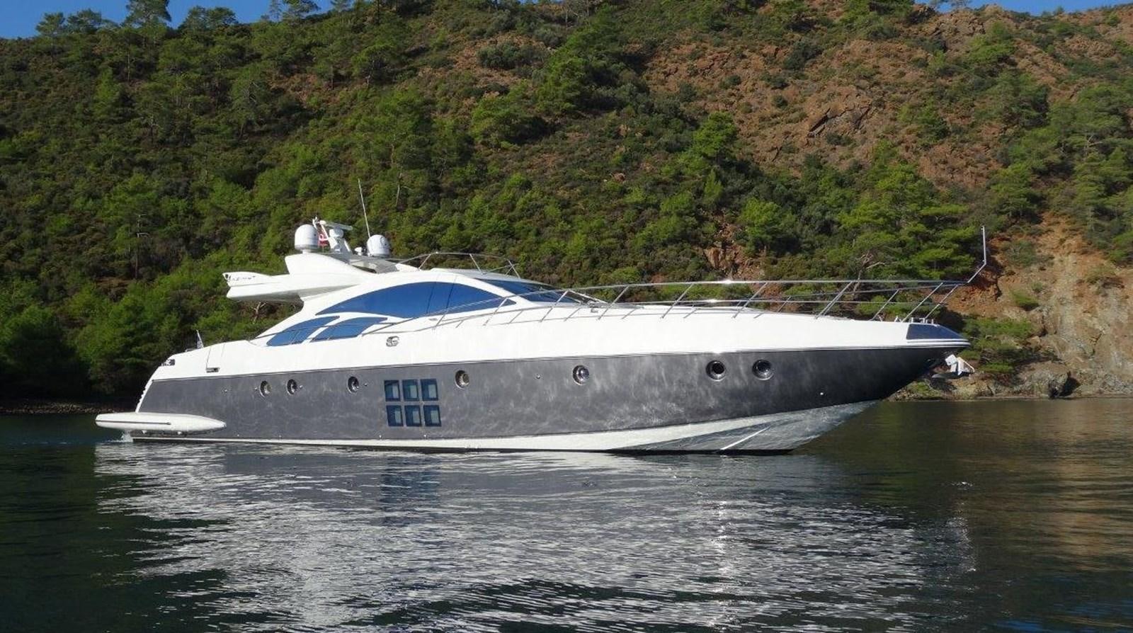 a white yacht in the water aboard PATRIOT Yacht for Sale