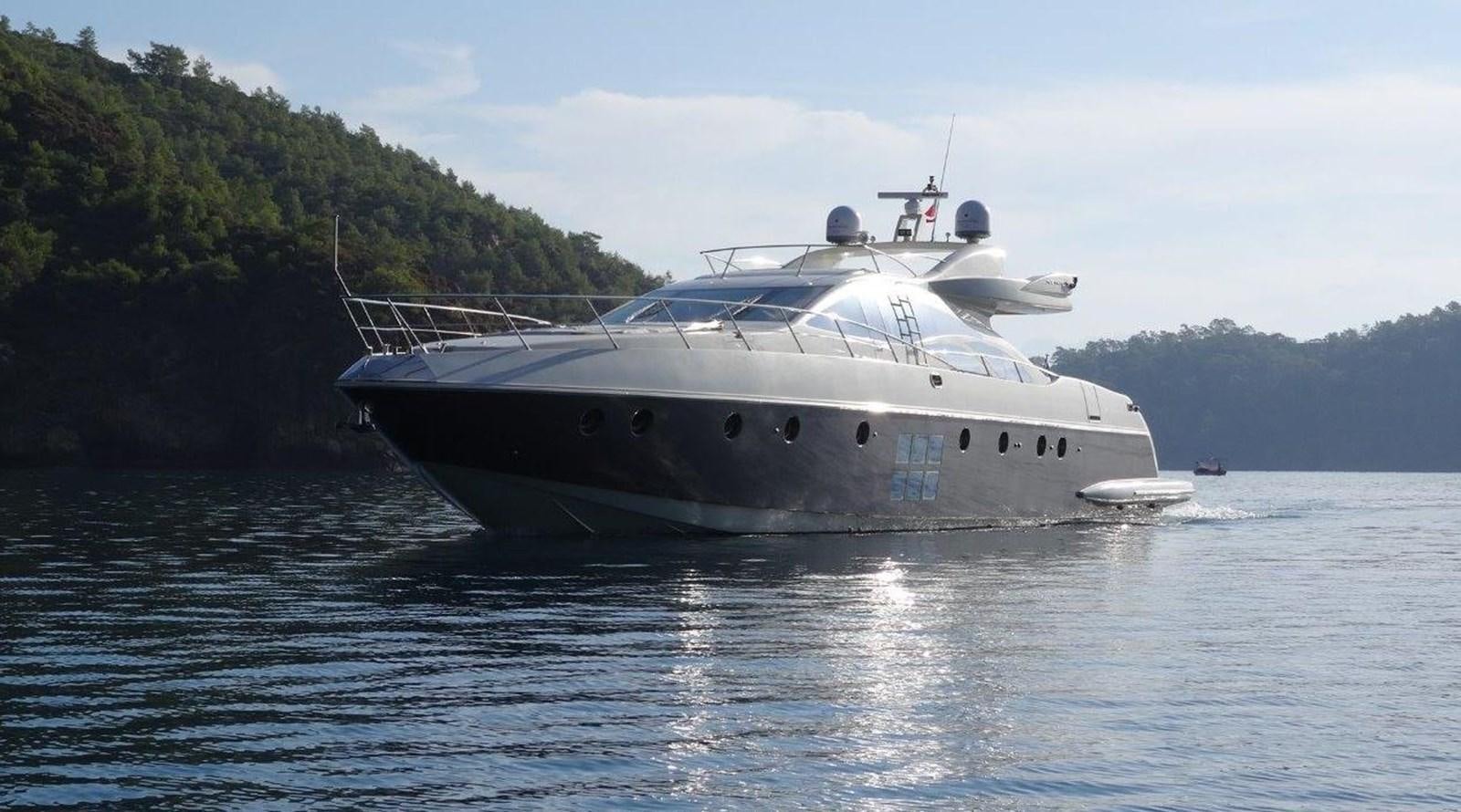 a large white boat in the water aboard PATRIOT Yacht for Sale