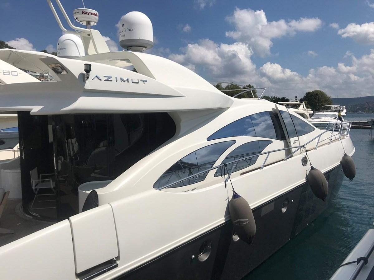 a white yacht on the water aboard PATRIOT Yacht for Sale