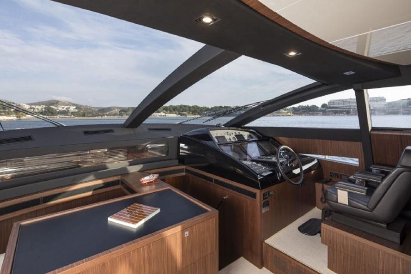 inside of a car aboard OXIDANTE Yacht for Sale