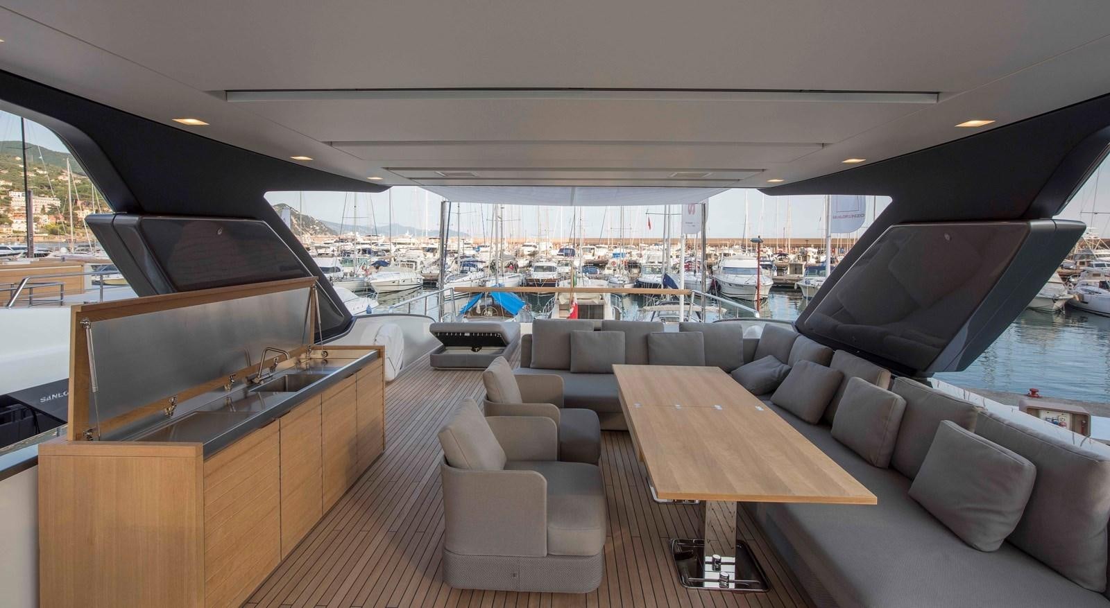 a large living room with a pool aboard MAJOLA Yacht for Sale