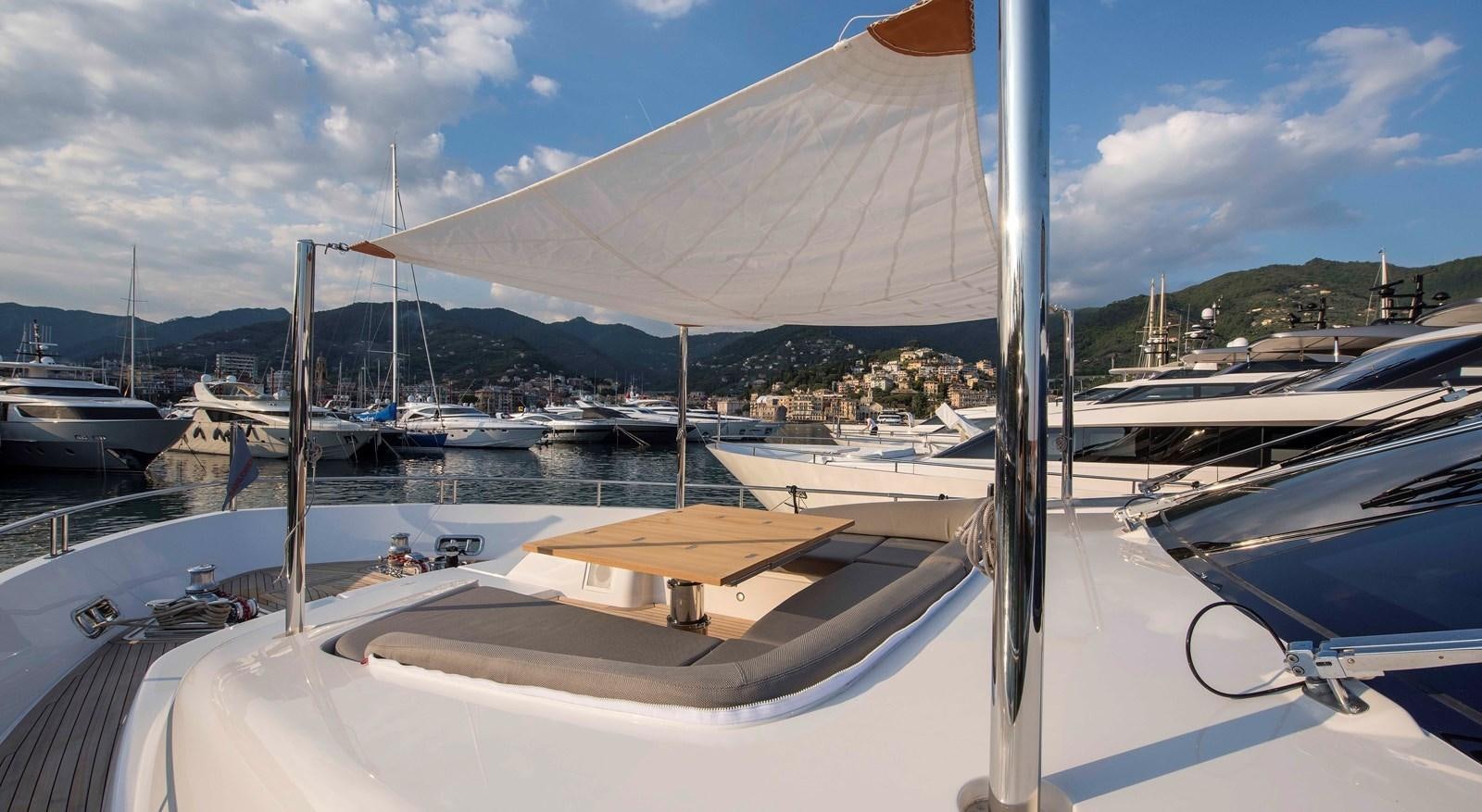 a sailboat in a harbor aboard MAJOLA Yacht for Sale