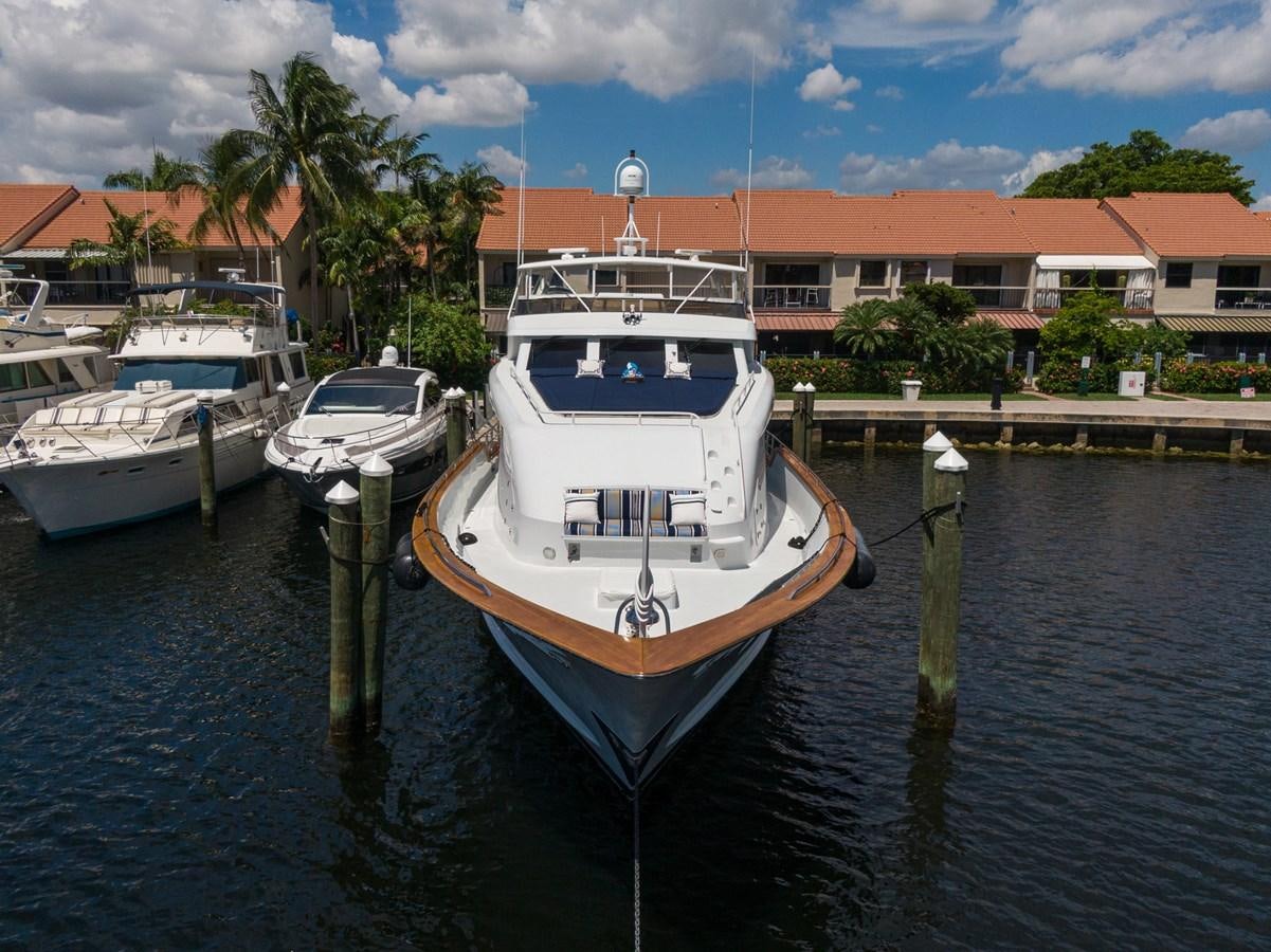 boats docked at a pier aboard UNLEASHED Yacht for Sale