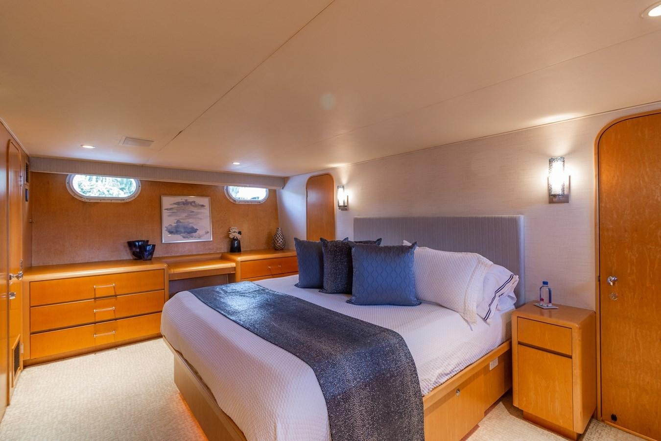 a bed in a room aboard UNLEASHED Yacht for Sale