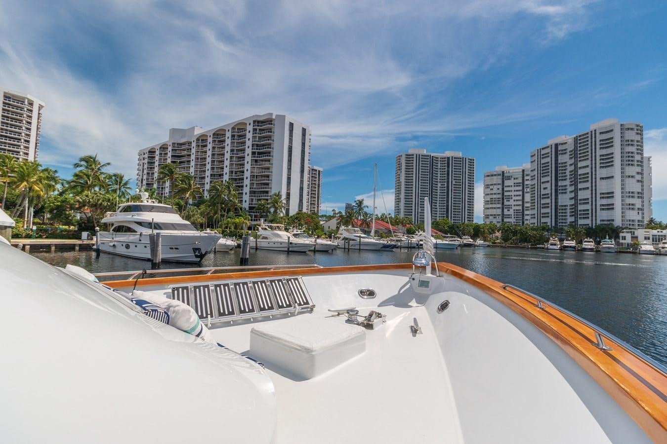 a boat docked at a pier aboard UNLEASHED Yacht for Sale