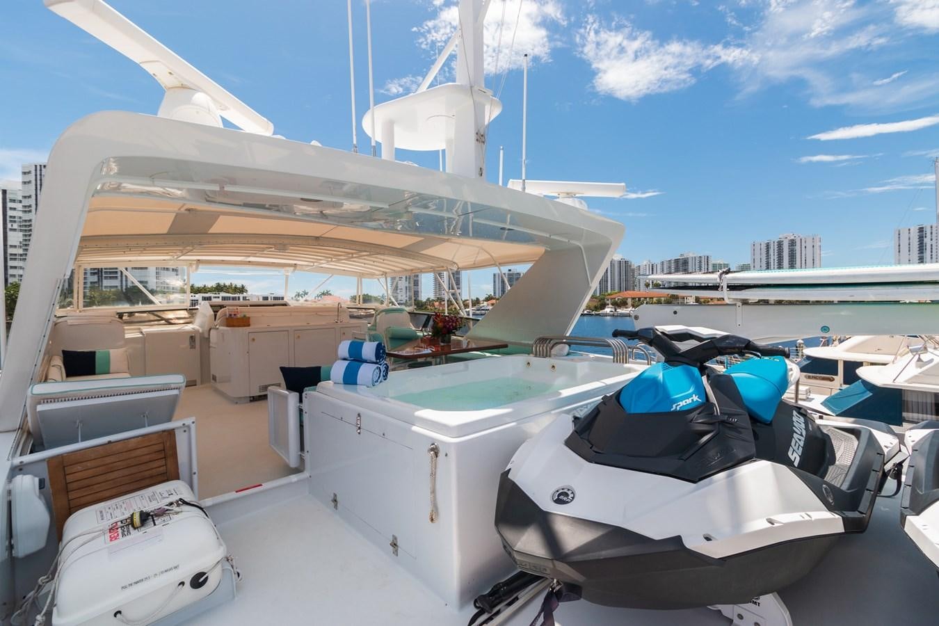 a boat docked at a pier aboard UNLEASHED Yacht for Sale