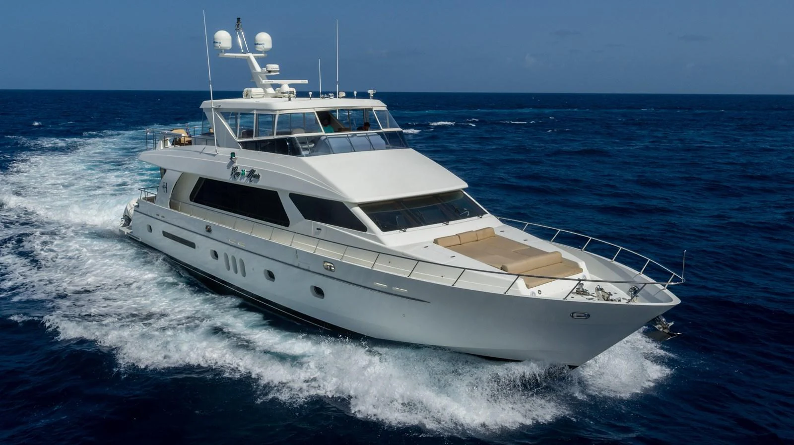 a white yacht on the water aboard ROXY MARIA Yacht for Sale
