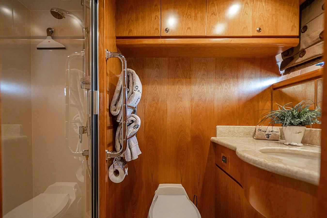 a bathroom with a sink and a shower aboard ROXY MARIA Yacht for Sale