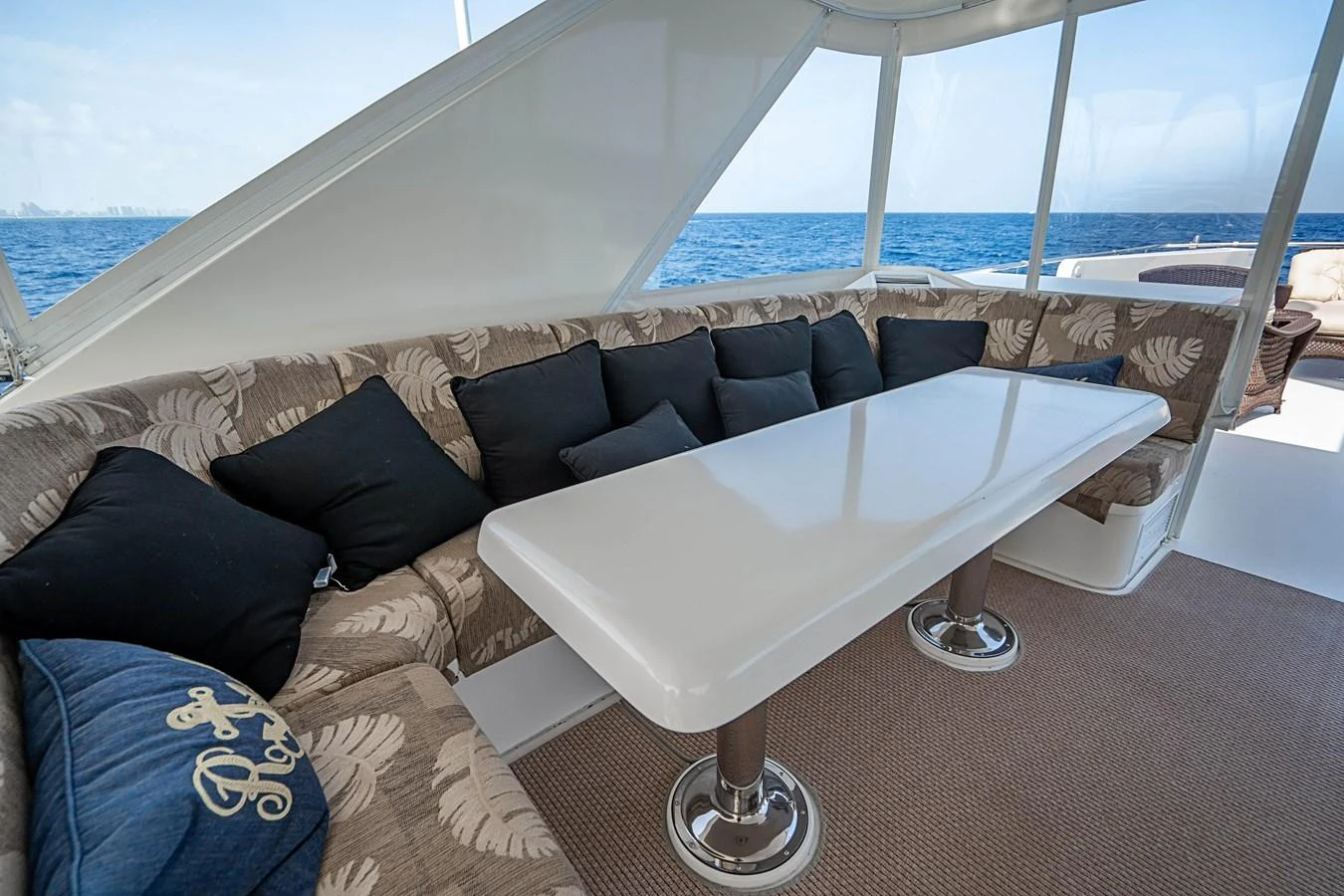 a white table on a boat aboard ROXY MARIA Yacht for Sale