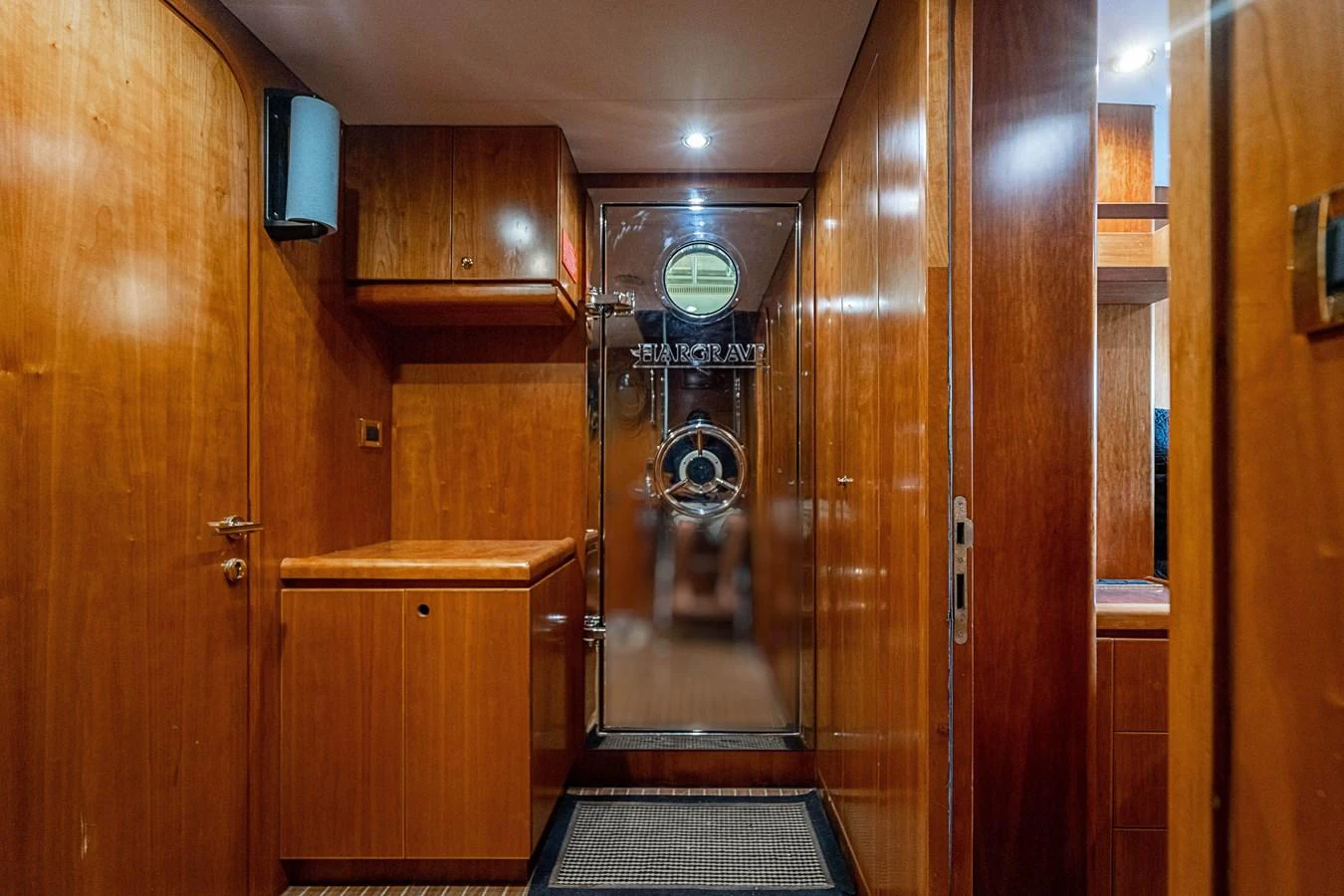 a room with wooden cabinets aboard ROXY MARIA Yacht for Sale