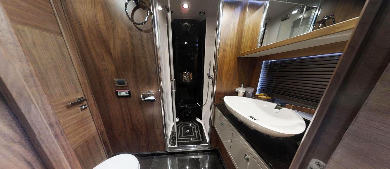 a bathroom with a sink and a mirror aboard NEMESIS Yacht for Sale