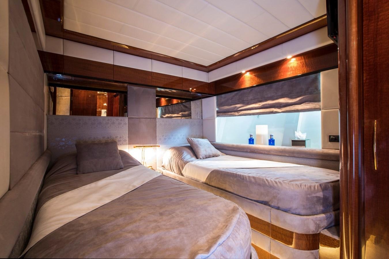 a room with two beds aboard SERAPH Yacht for Sale