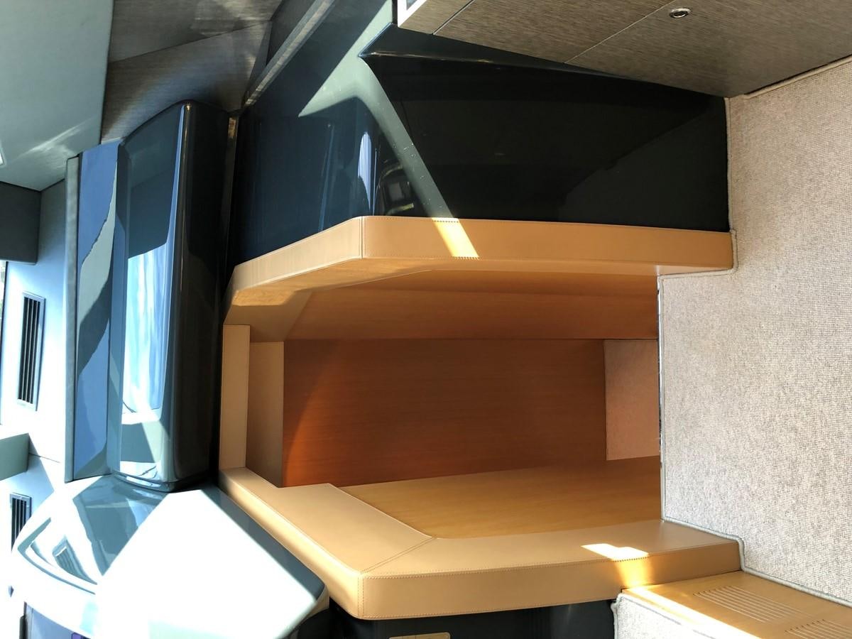 a staircase with a glass window aboard RIVA 86 Yacht for Sale