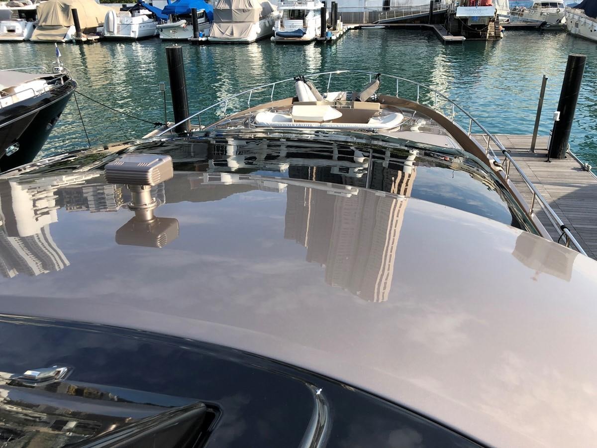 a boat on the water aboard RIVA 86 Yacht for Sale