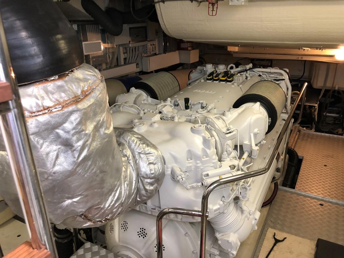 a machine with a large metal cylinder aboard RIVA 86 Yacht for Sale