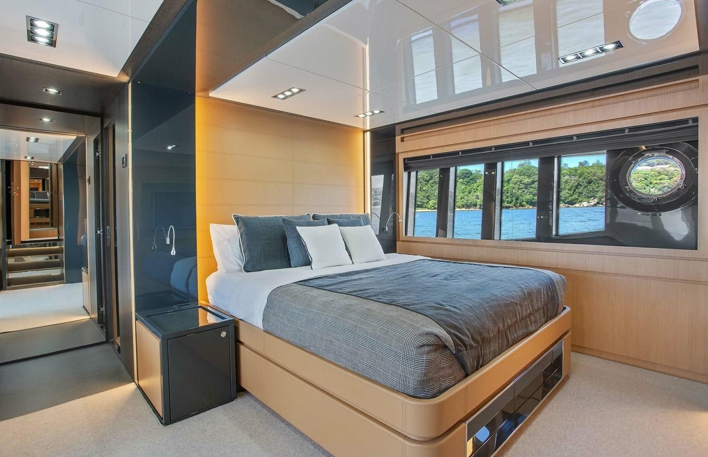 a bed in a room aboard RIVA 88 DOMINO Yacht for Sale