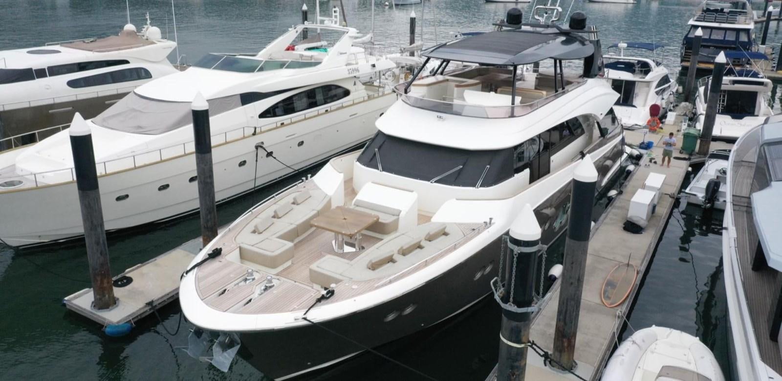 a group of boats are parked in a harbor aboard MCY 86/04 Yacht for Sale