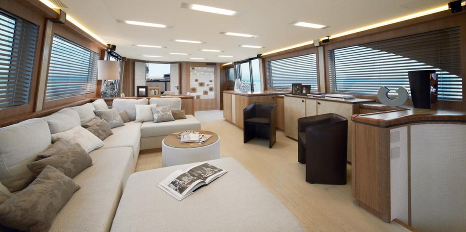 a living room with a couch and a coffee table aboard MCY 86/04 Yacht for Sale