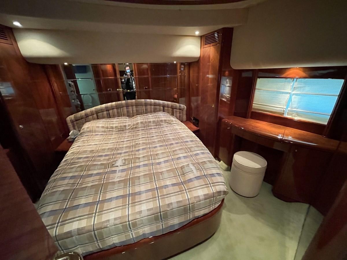 a bed in a room aboard AZIMUT 85 ULTIMATE Yacht for Sale