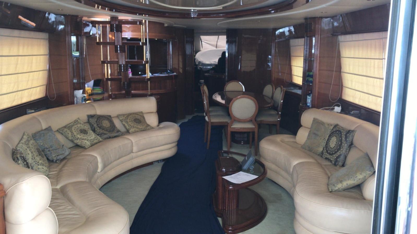 a living room with a couch and a table aboard AZIMUT 85 ULTIMATE Yacht for Sale