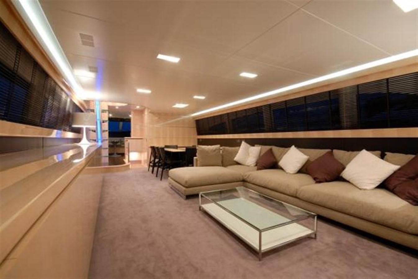 a large living room with a couch aboard SANS SOUCI Yacht for Sale