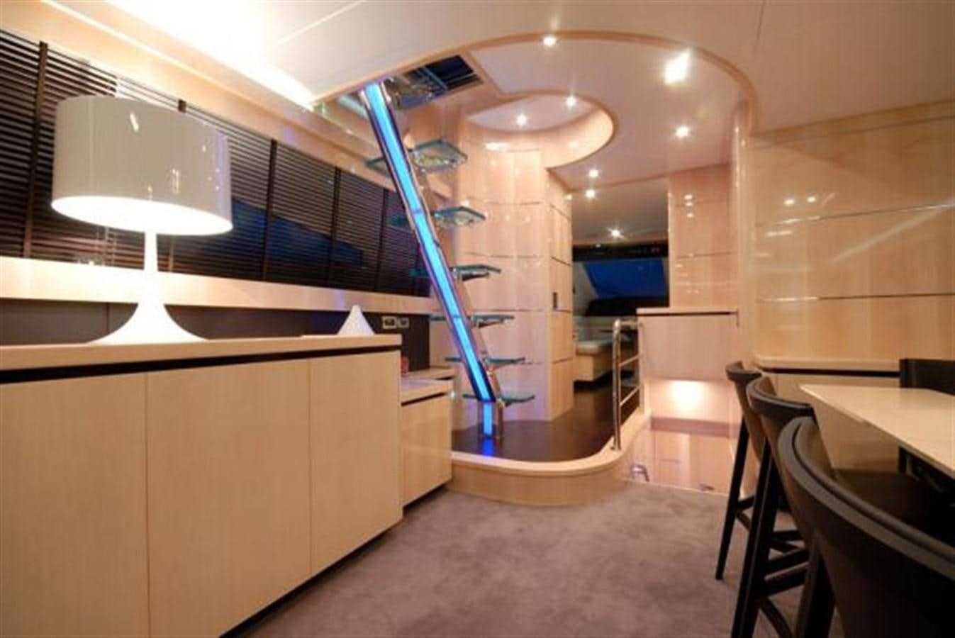 a room with a large glass wall and a ladder aboard SANS SOUCI Yacht for Sale