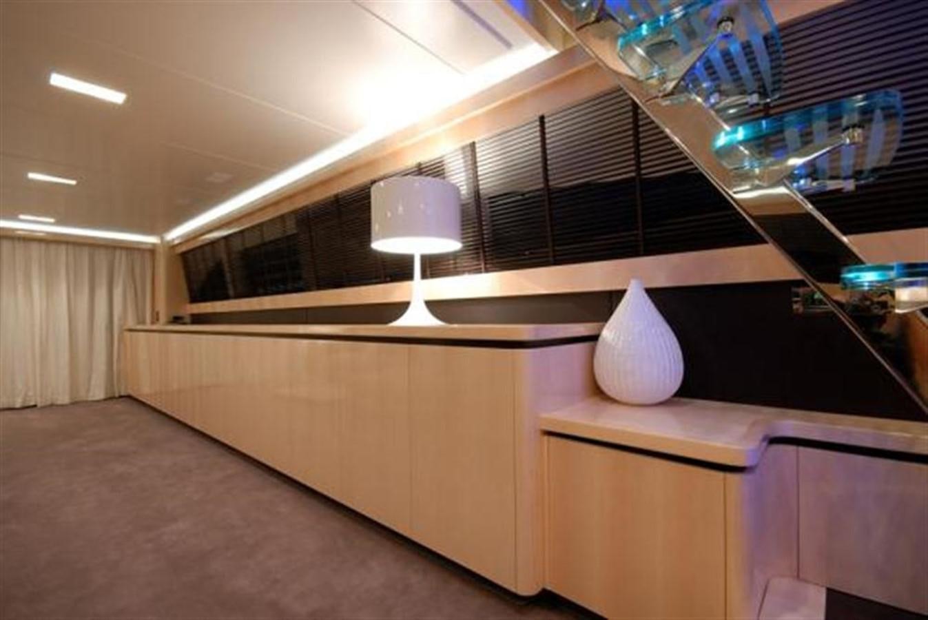 a room with a lamp and a white object on the ceiling aboard SANS SOUCI Yacht for Sale