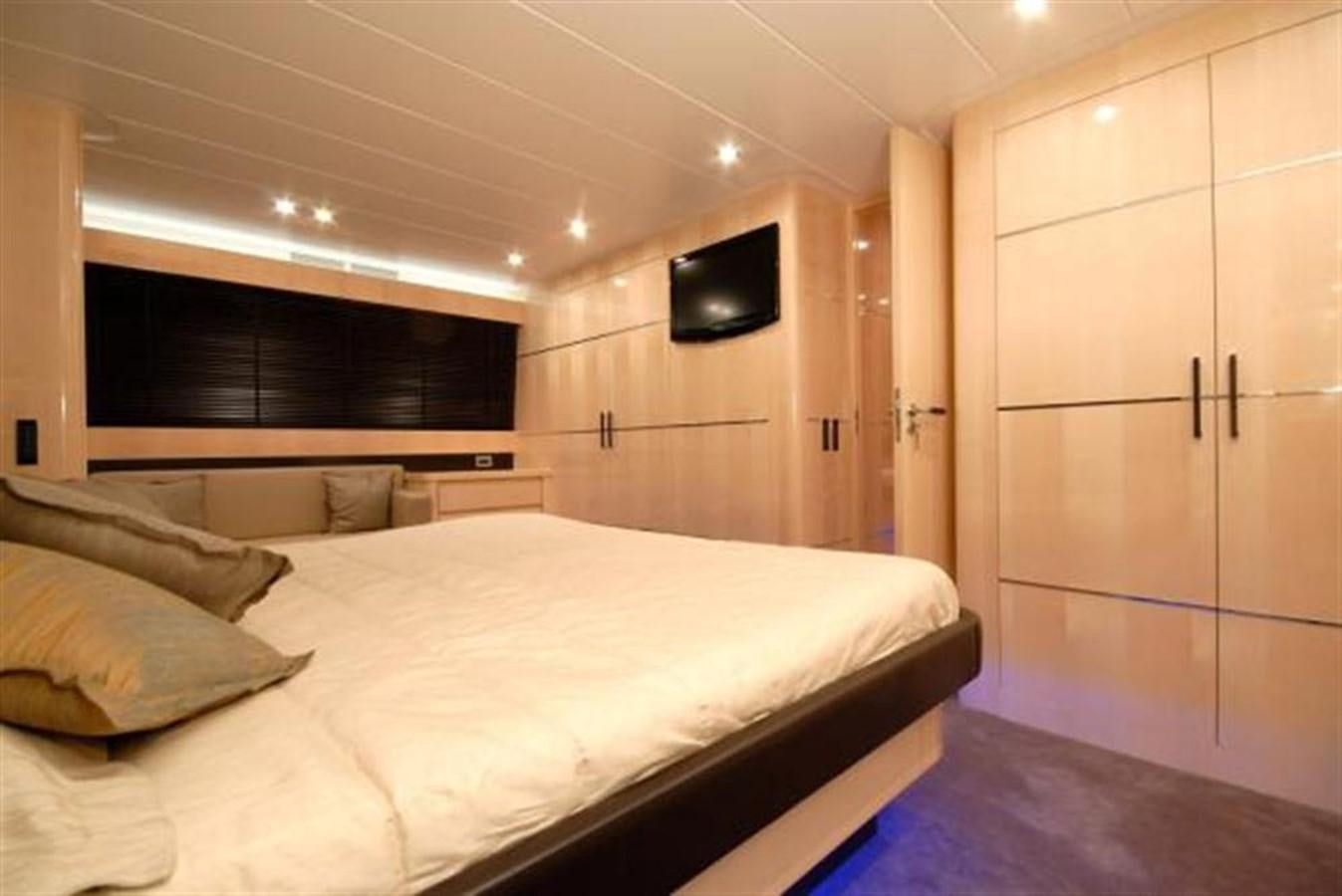a large white bed in a room aboard SANS SOUCI Yacht for Sale
