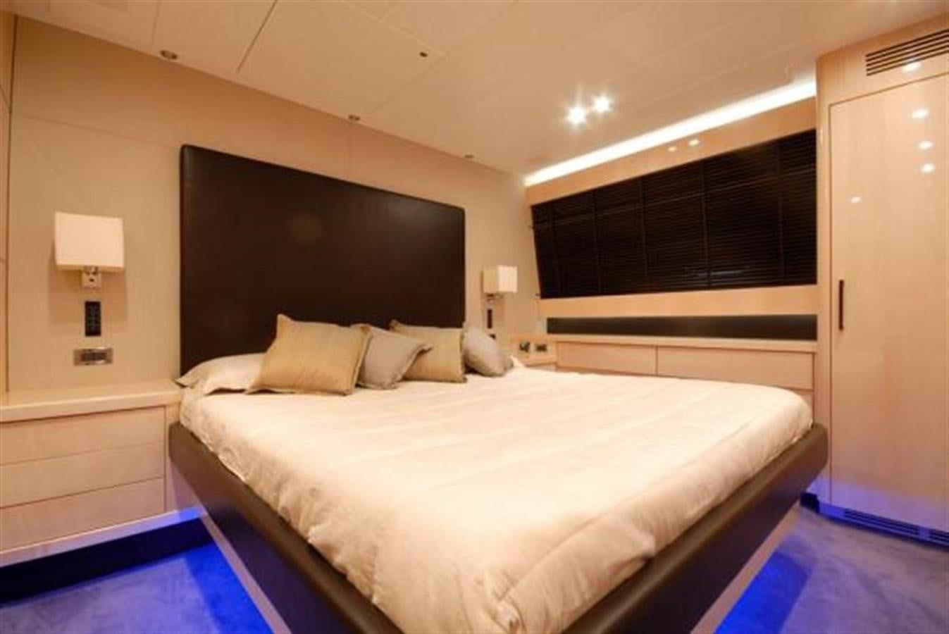 a bed in a room aboard SANS SOUCI Yacht for Sale