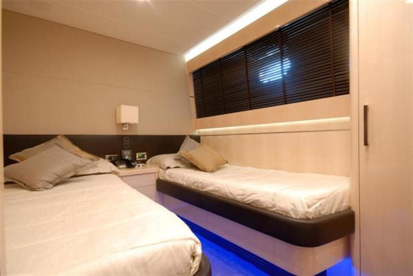 a couple of beds in a hotel room aboard SANS SOUCI Yacht for Sale