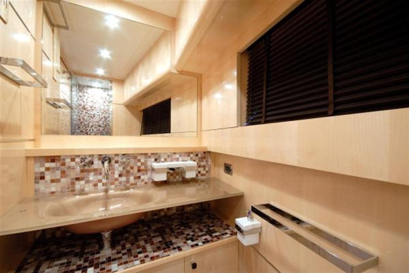 a kitchen with a sink and cabinets aboard SANS SOUCI Yacht for Sale