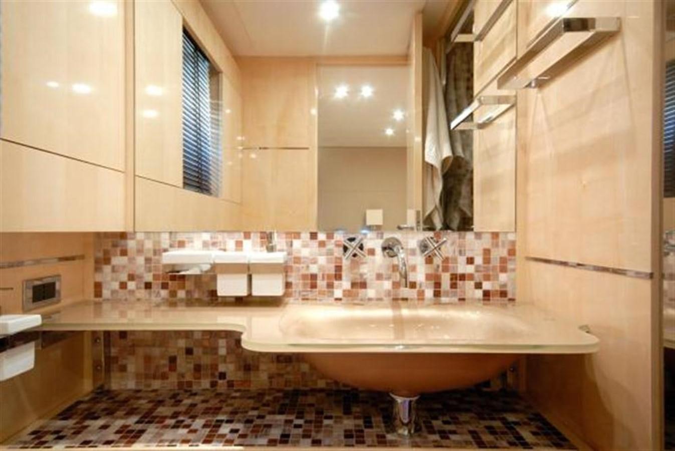a bathroom with a large mirror aboard SANS SOUCI Yacht for Sale