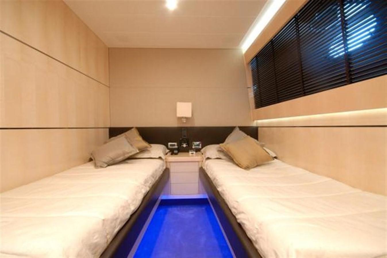 a room with two beds aboard SANS SOUCI Yacht for Sale