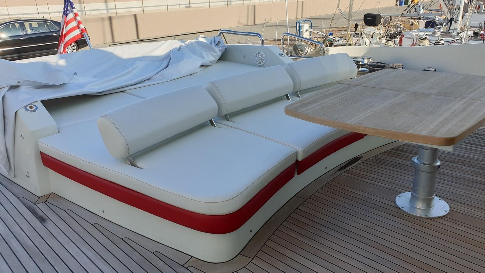 a white and red boat aboard MR LEO Yacht for Sale