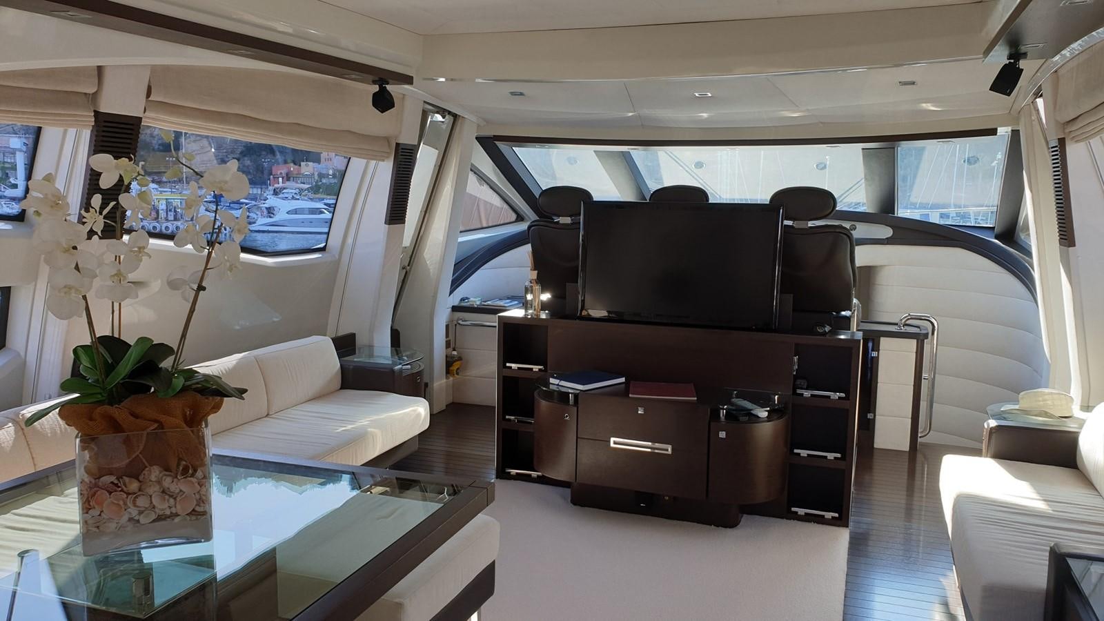 a room with a piano and a couch aboard MR LEO Yacht for Sale