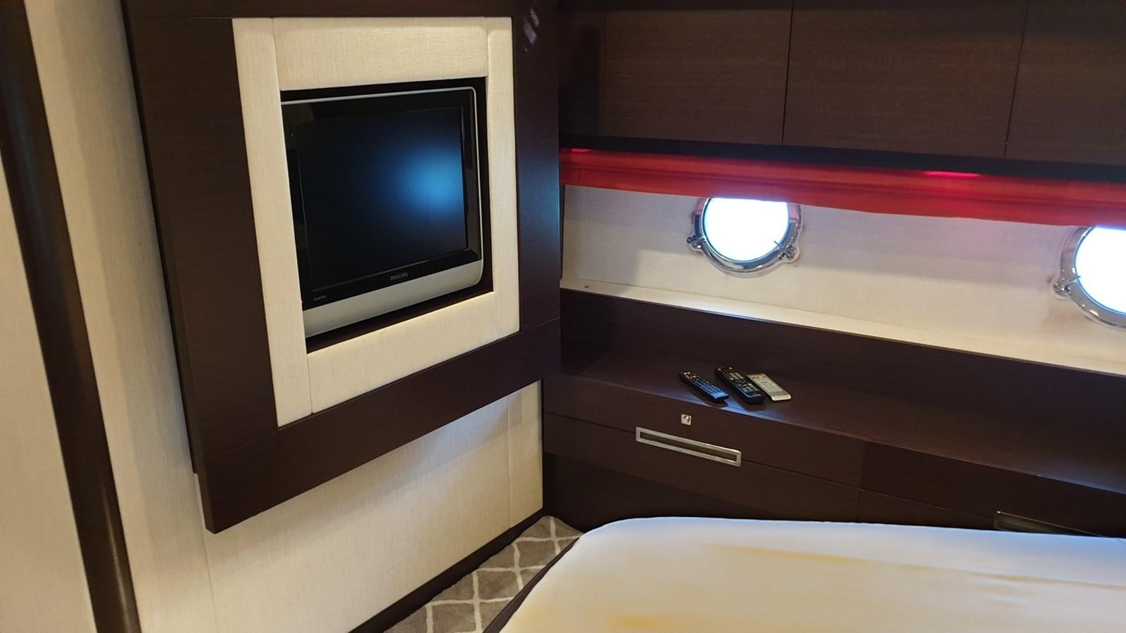 a tv on a shelf aboard MR LEO Yacht for Sale