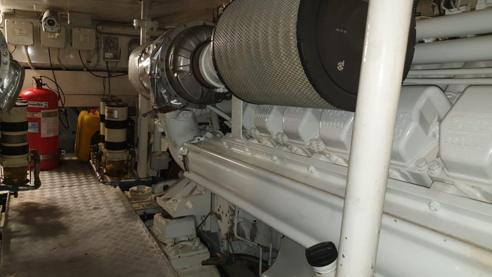 a large white machine aboard MR LEO Yacht for Sale