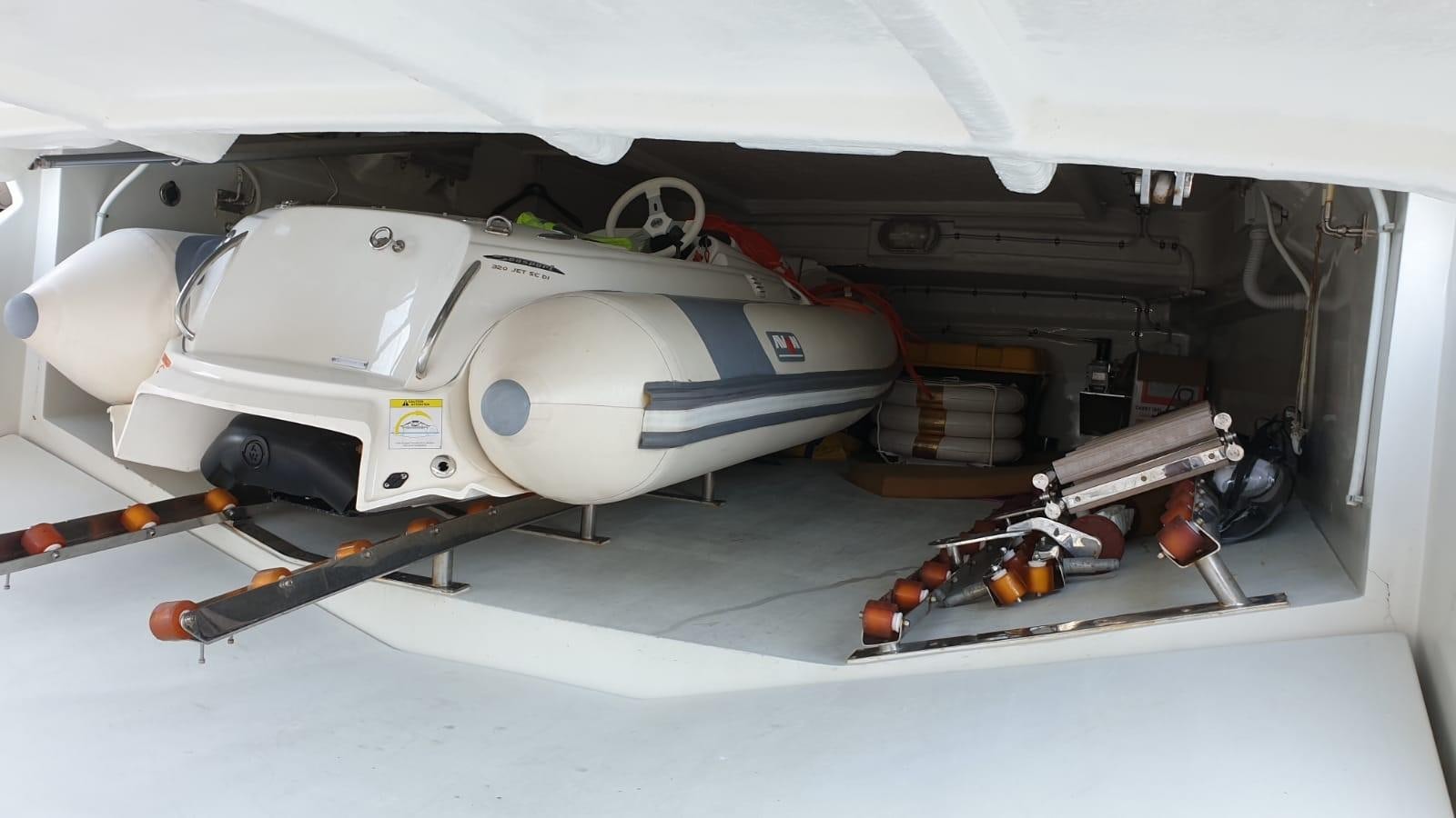 a white machine with a black handle aboard MR LEO Yacht for Sale