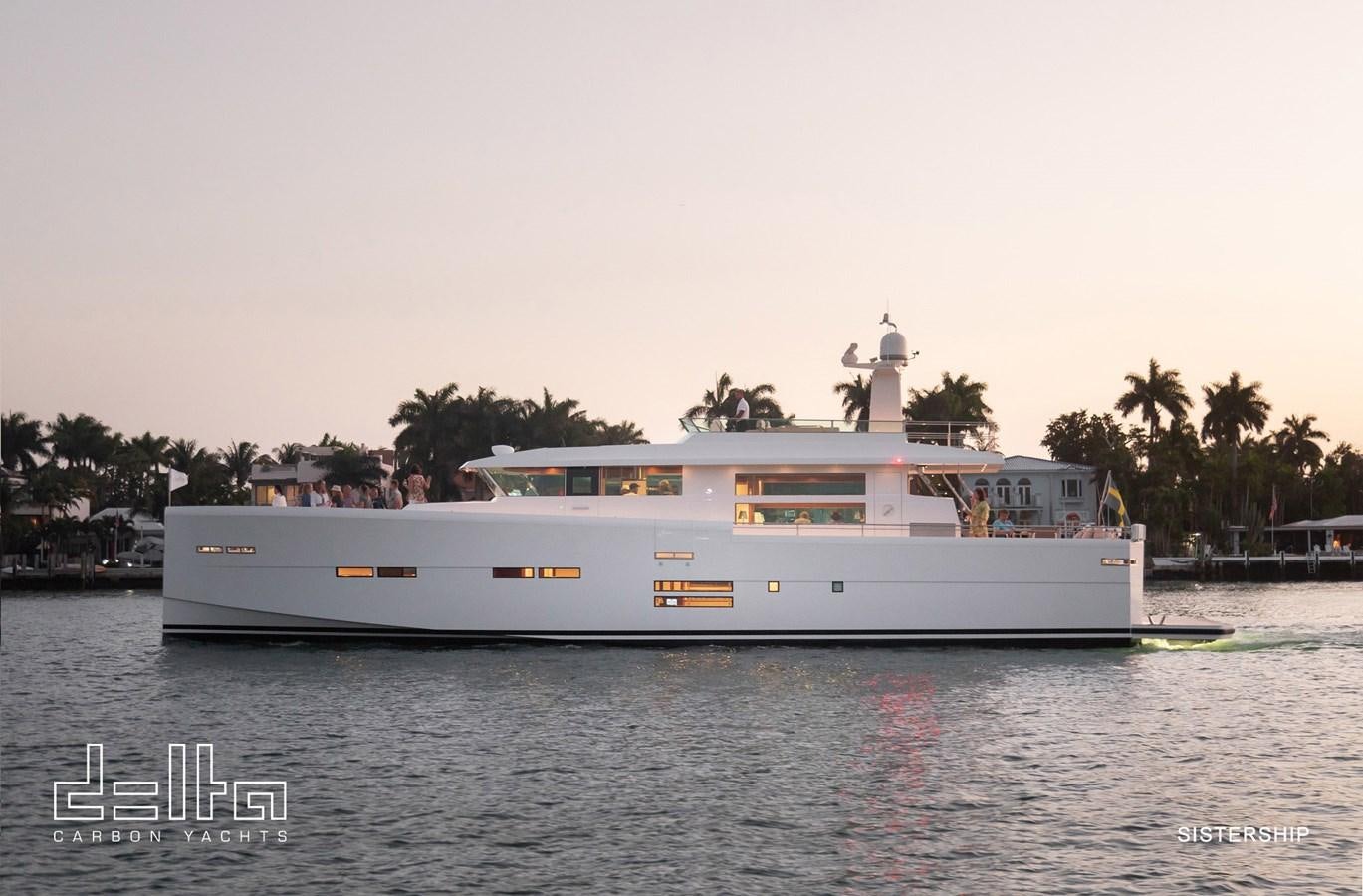 a large white boat on the water aboard DELTA 88 CARBON Yacht for Sale
