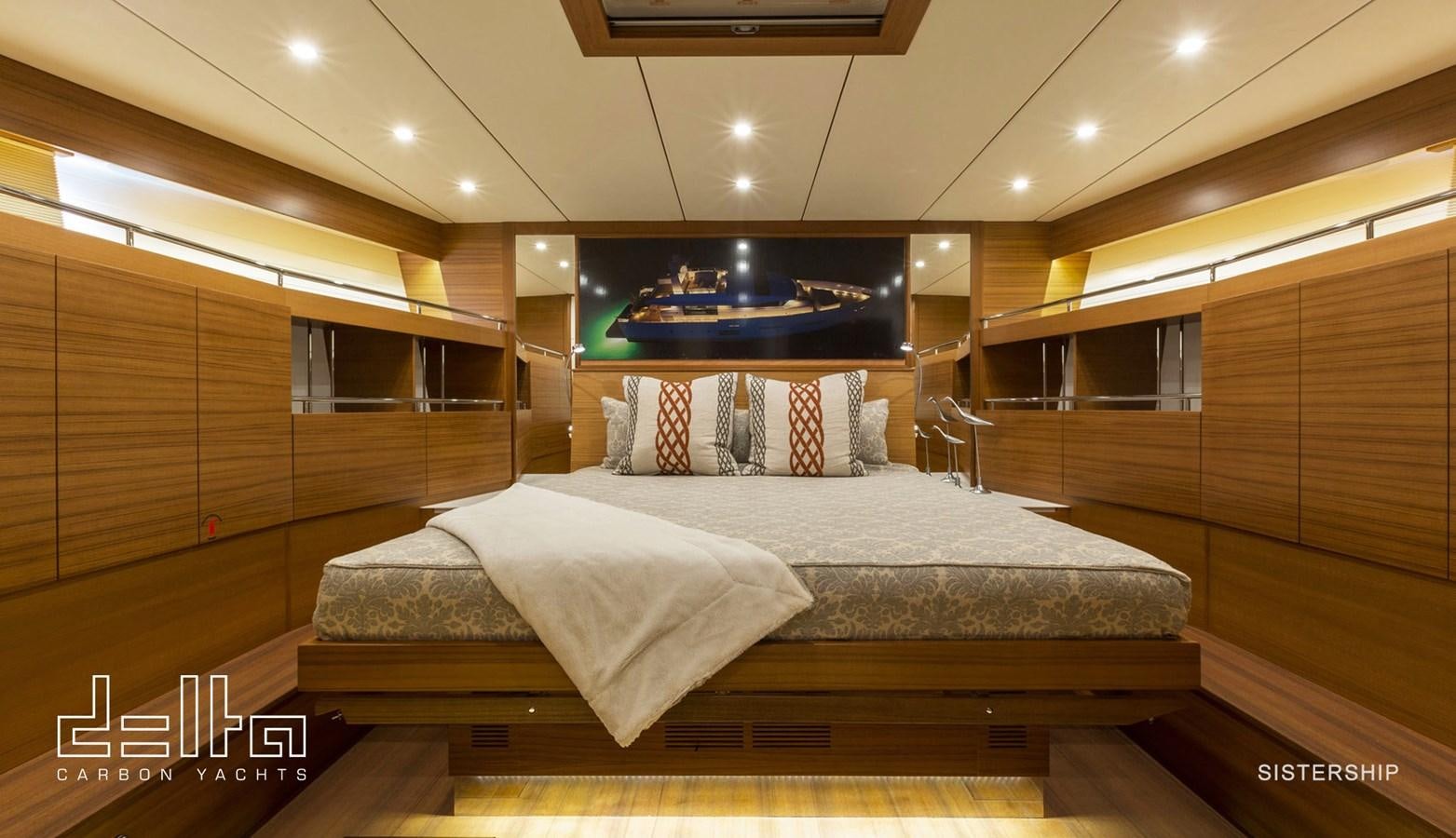 a bed in a room aboard DELTA 88 CARBON Yacht for Sale