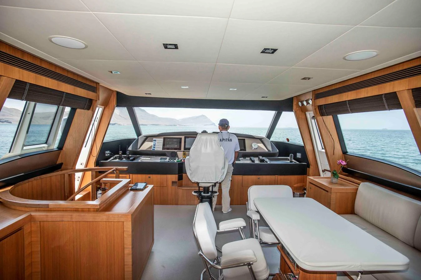 a person standing on a boat aboard NUR Yacht for Sale