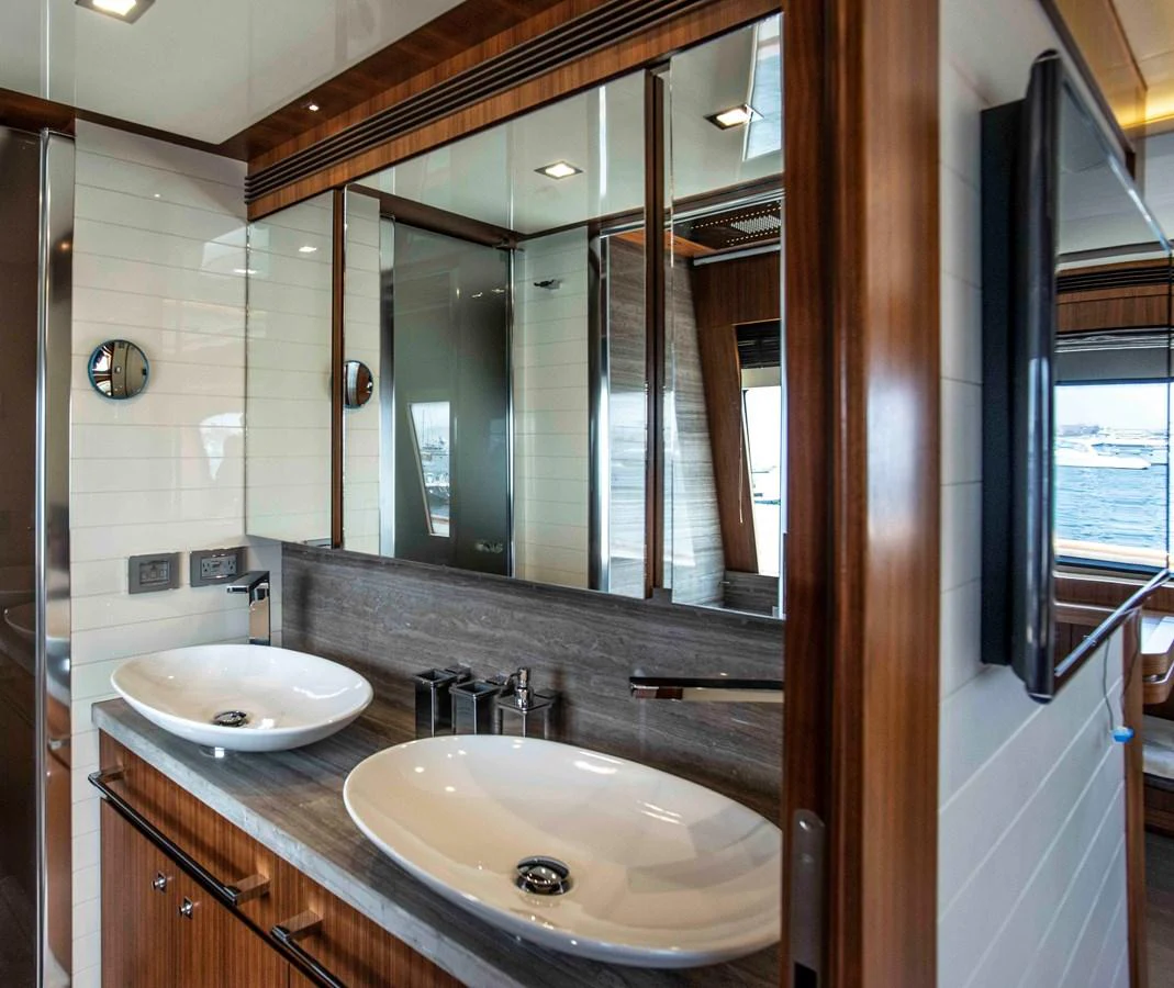 a bathroom with two sinks aboard NUR Yacht for Sale