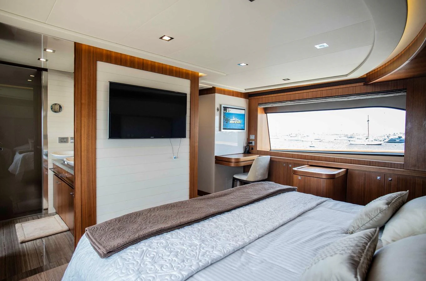 a bed in a room aboard NUR Yacht for Sale
