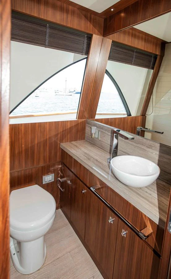 a bathroom with a sink and a toilet aboard NUR Yacht for Sale