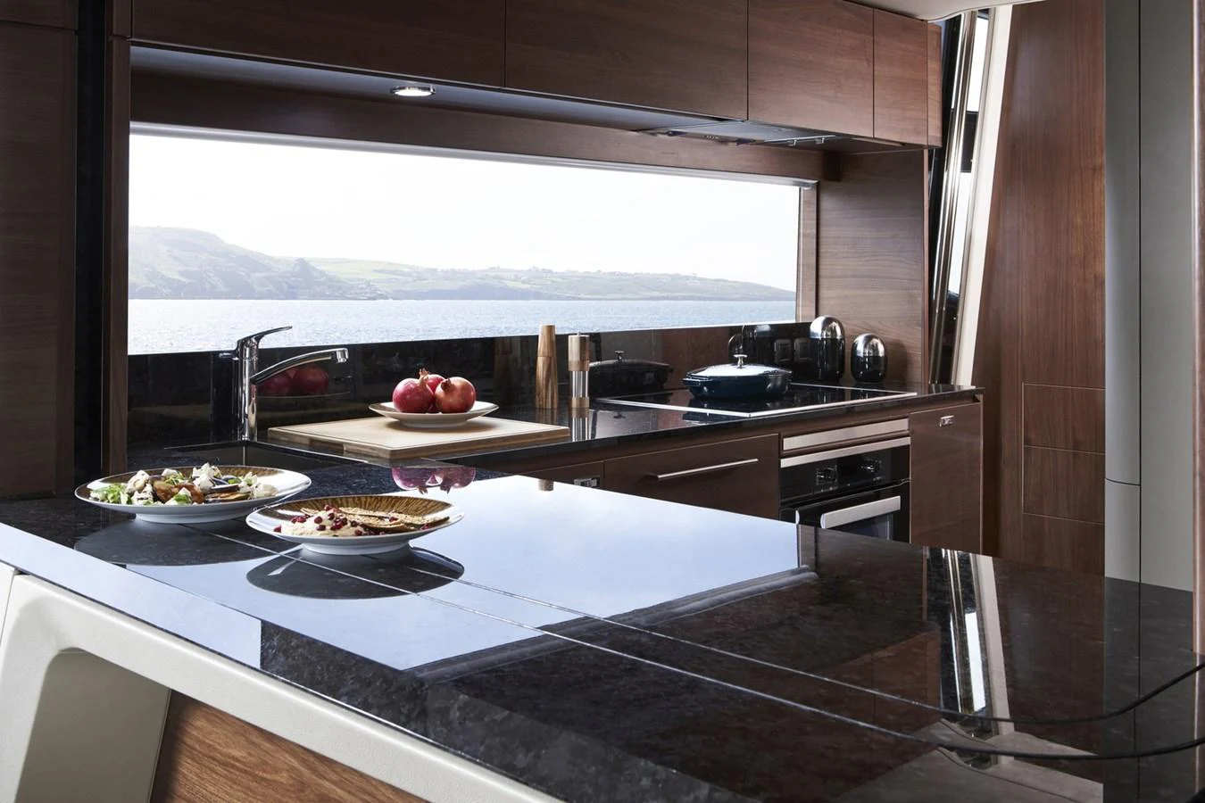 a kitchen with a large window aboard PRINCESS 85MY 2019 Yacht for Sale