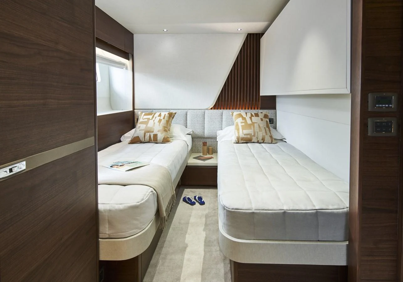 a room with two beds aboard PRINCESS 85MY 2019 Yacht for Sale
