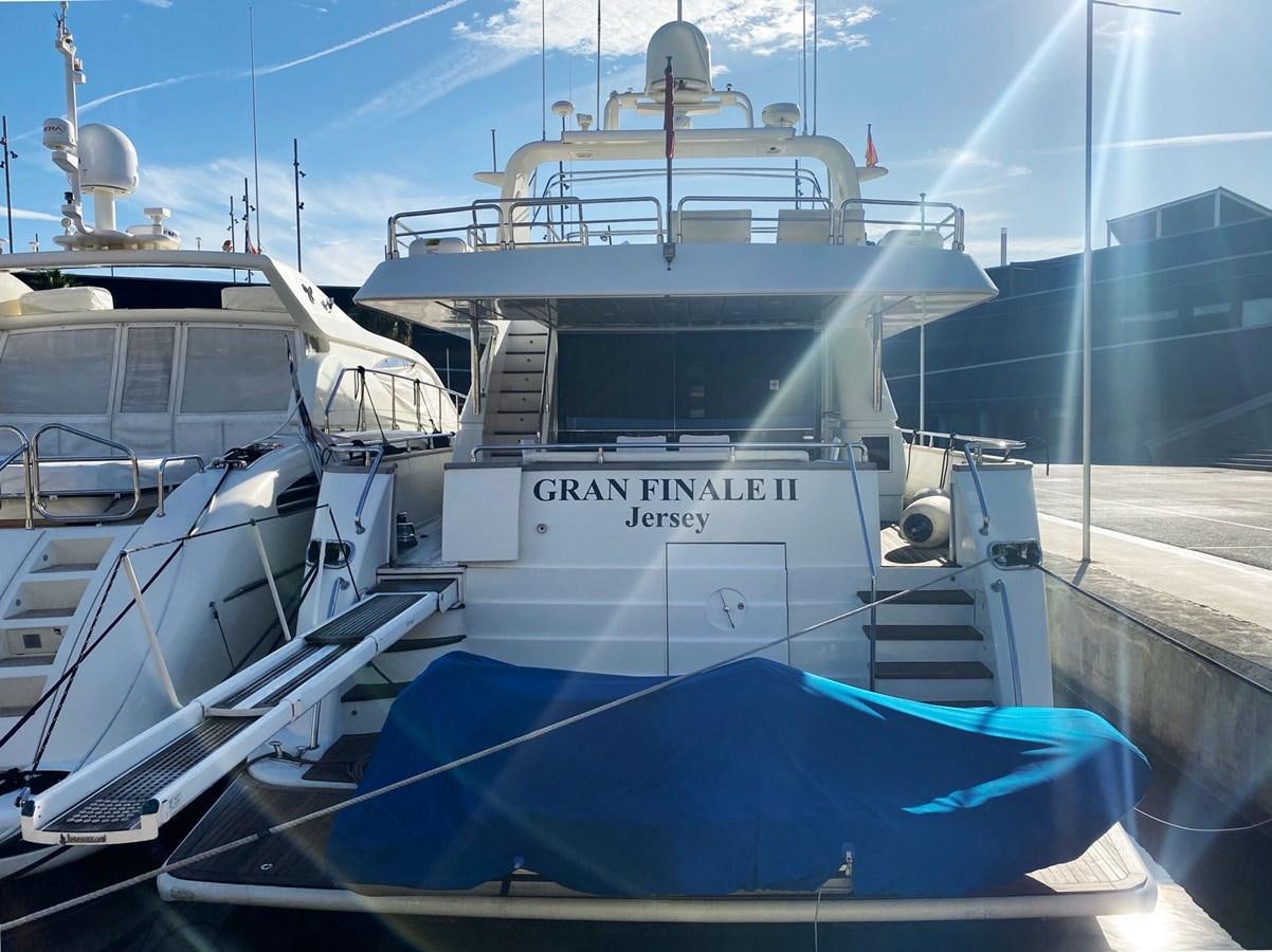 a boat on a dock aboard GRAN FINALE II Yacht for Sale